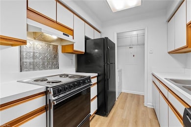 New LVP flooring throughout kitchen and laundry ro