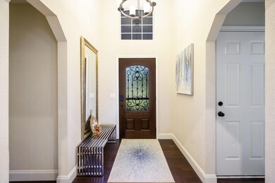Foyer featuring dark hardwood / wood-style floors 