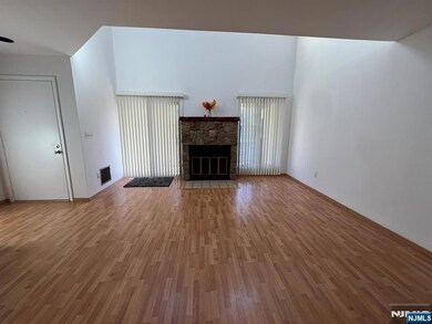Living Room with Wood Burning Fireplace