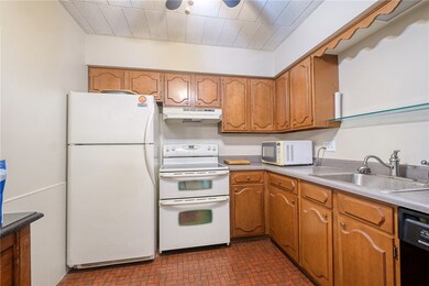 Kitchen has a ton of cabinet and counter space