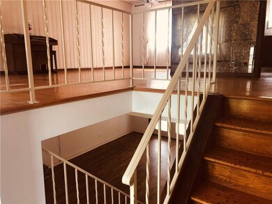 View of Main Level with Steps to the Lower Family 
