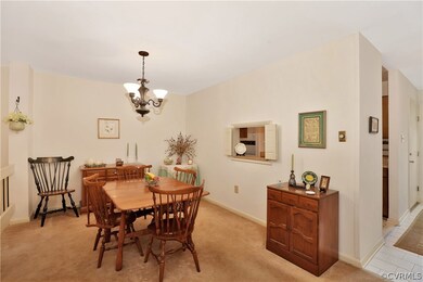 Foyer leading into the dining area has hall closet