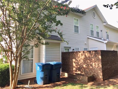 Private, brick enclosed back patio.