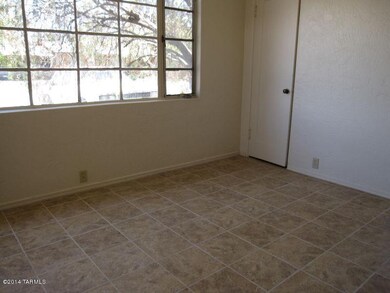 Brown Wy Living room has lots of windows