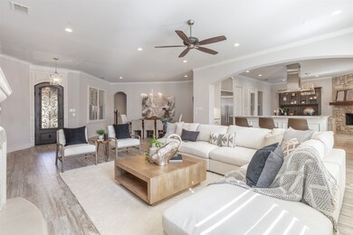 Opens to kitchen and dining