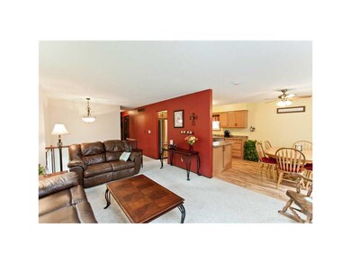 Living Room. Great flow from living room into kitc