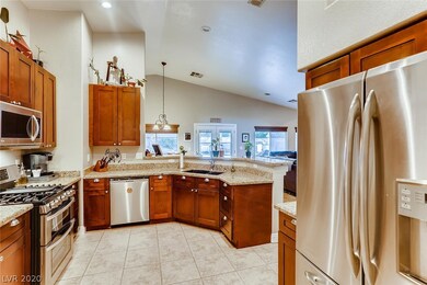 Kitchen overlooks Dining Area and Family Room