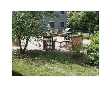 Exterior Back. Common Patio