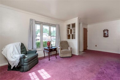 Large picture windows flood the space with natural