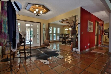 Front foyer with formal dining room on the right