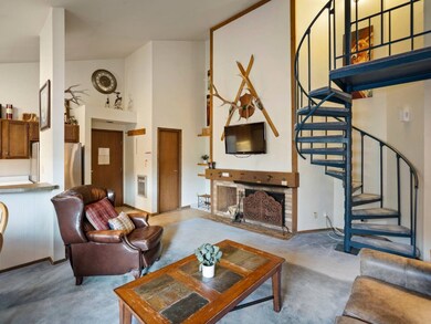 Living room with light colored carpet