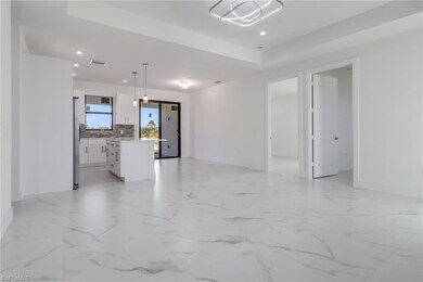 Unfurnished living room with sink