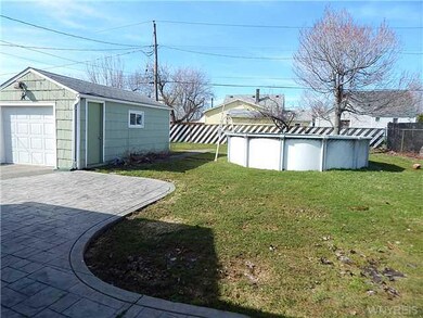 Backyard. Fully fenced yard.  All the homes around