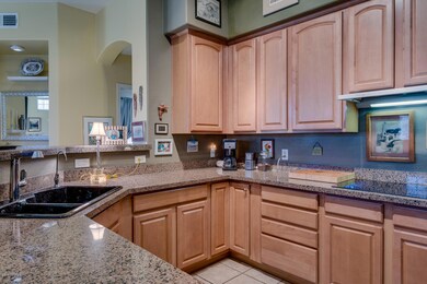 14_11000_N_77th_Pl__Unit_2085__15_mls