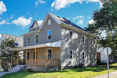Situated on a corner lot, this newly renovated hom