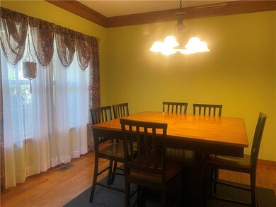 Formal dining room. Table stays!