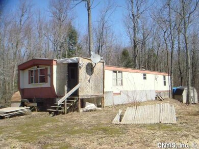 Exterior Front. Mobile Home on 15.60 Acres.  Plus 