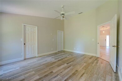 Spare room with light wood-type flooring, ceiling