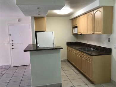 10744 N Kendall Dr unit M16, Miami, FL 33176 - photo 3