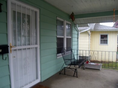 Envision yourself sitting on this front porch enjo