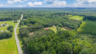 Drone / aerial view of a heavily wooded area