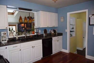 Kitchen overlooking family room with...