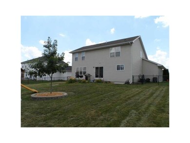 Exterior Back. Great fenced yard with patio for en