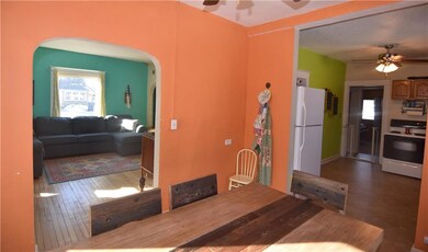 Dining area with linoleim flooring.