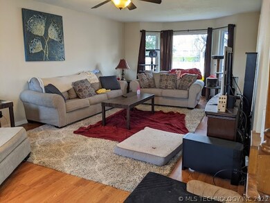 Living room, looking from back door towards the fr
