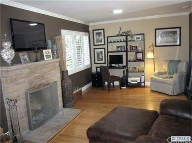 Living Room with stacked stone fireplace