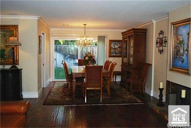 Spacious Dining Room Includes An Elegant Crystal C