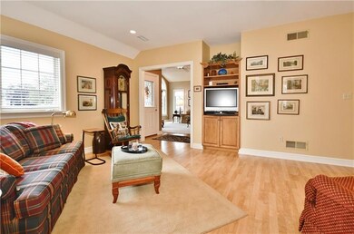 Another view of the family room facing the foyer w