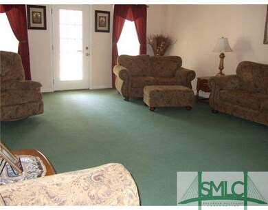 Den/Family/Great Room. Door opens to screened porc