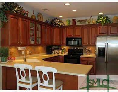 Kitchen. Kitchen has a wonder breakfast bar.