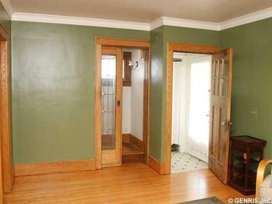Foyer. FRONT FOYER HAS COAT CLOSET AND TILE FLOOR.