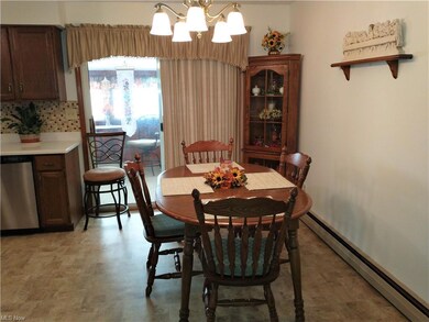Dining area off kitchen and sliding doors to 3 sea
