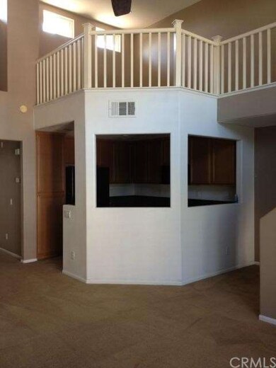 From Family Room Facing Kitchen With Loft Above