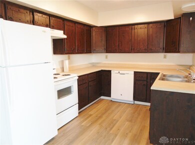 Kitchen: Dishwasher, range, refrigerator