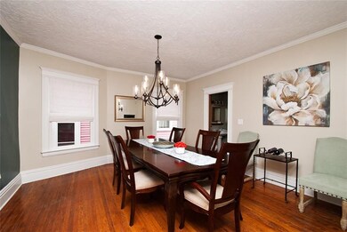 Formal dining room can comfortably seat 10.