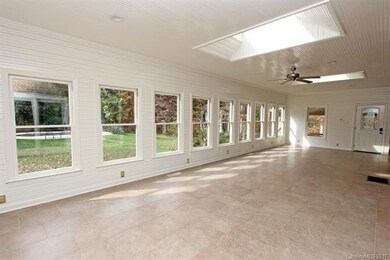 Huge, Freshly Painted Sun Room with Skylights, Til