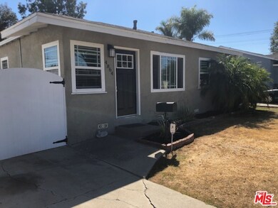 Gated driveway to garage