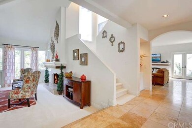 Double entry doors lead to this beautiful foyer fl