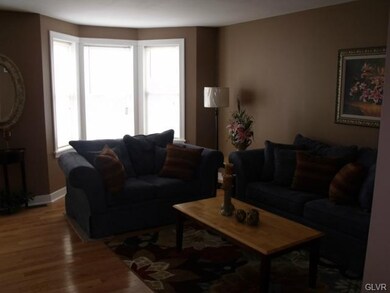 Model Pictured... 1st floor living room with hard 
