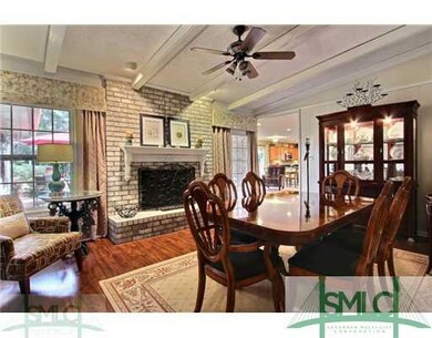 Dining Room. Dining Room with fireplace opens to F