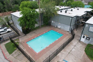 Refreshing outdoor pool with lounge chairs, perfec
