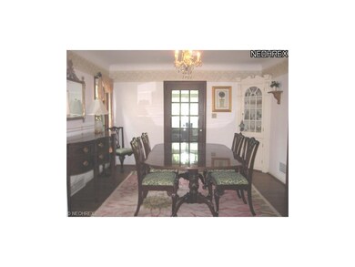 FORMAL DINING ROOM WITH FRENCH DOOR TO FAMILY ROOM