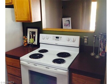 Kitchen complete with access to spacious living ro