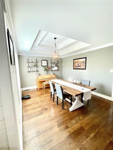 Dining Area w/Wood Flooring & Double Trey Ceiling