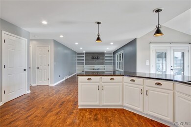 View from Kitchen into Family Room, French Doors t