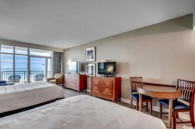 Bedroom with access to exterior and light wood-typ